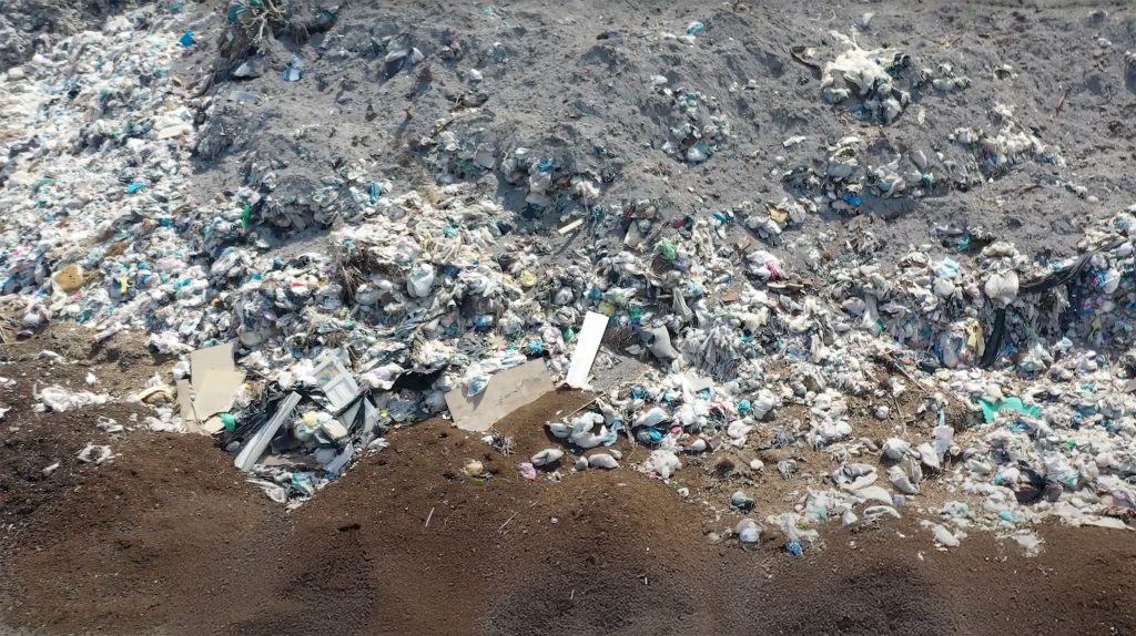 An open landfill seen from above.